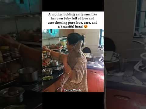 She Treats an Iguana Like Her Baby 🥹💚 #cuteanimals #mother #beautifulbond #mustwatch